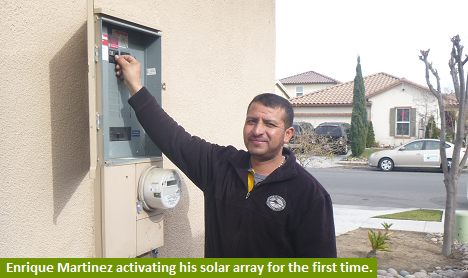 Enrique Martinez activating his solar array system for the first time at his home