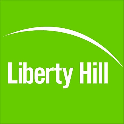 Liberty Hill logo with white text on bright green background with curved design element