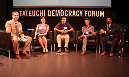 Five panelists seated on stage at the Tateuchi Democracy Forum discussing multifamily housing topics