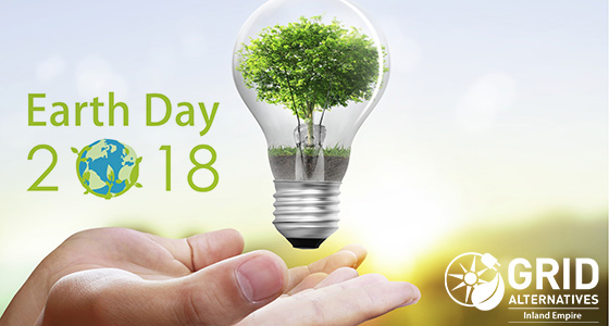 Hand holding lightbulb with green tree inside, "Earth Day 2018" text, GRID Alternatives logo