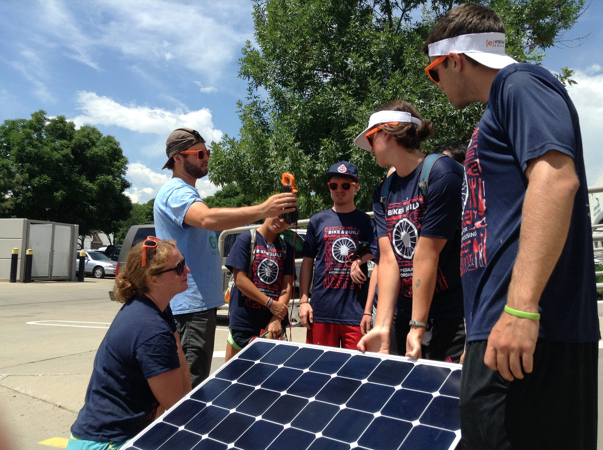 Cyclists practice testing solar modules
