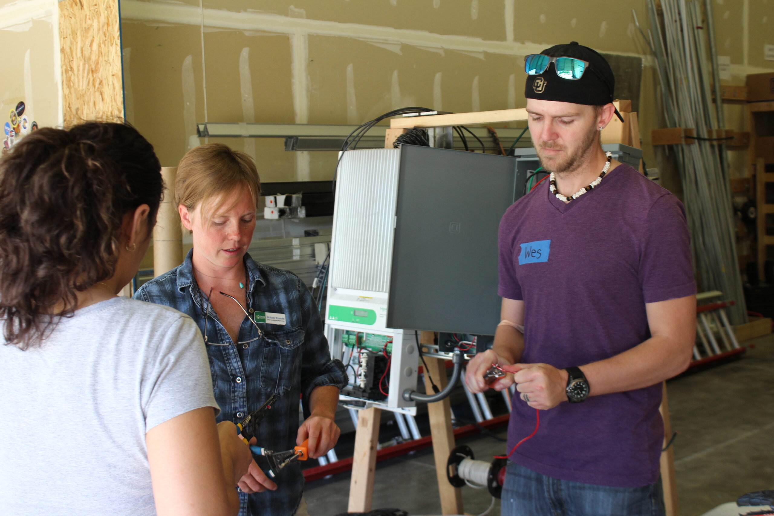 Wes (right) practices wire management