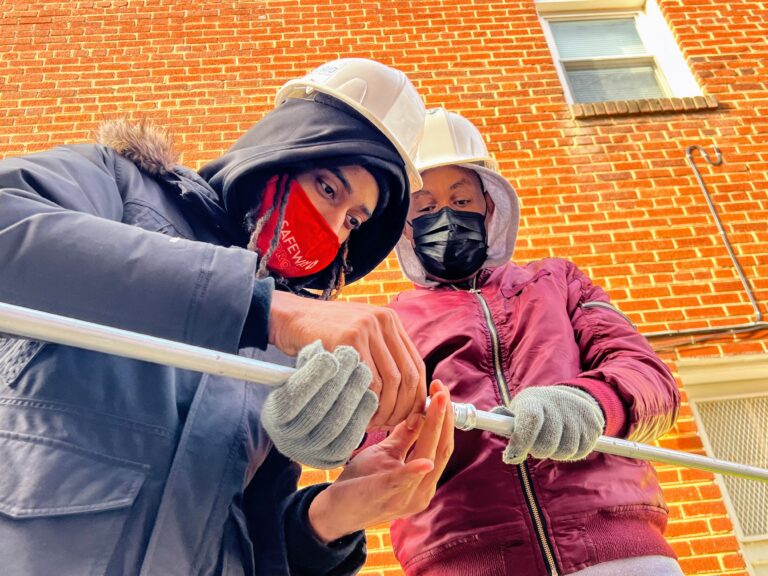 Trainees at a DC SolarWorks install, January 2022