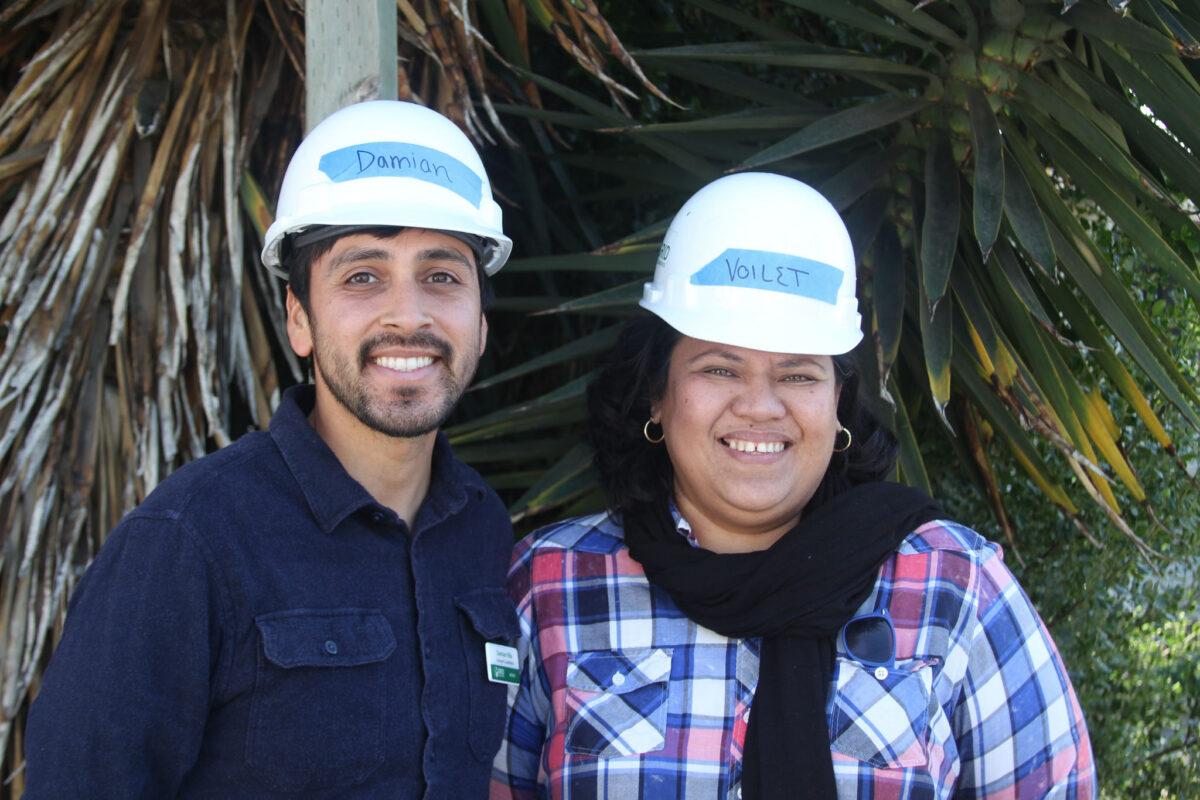 Damian smiling with a partner in East Palo Alto