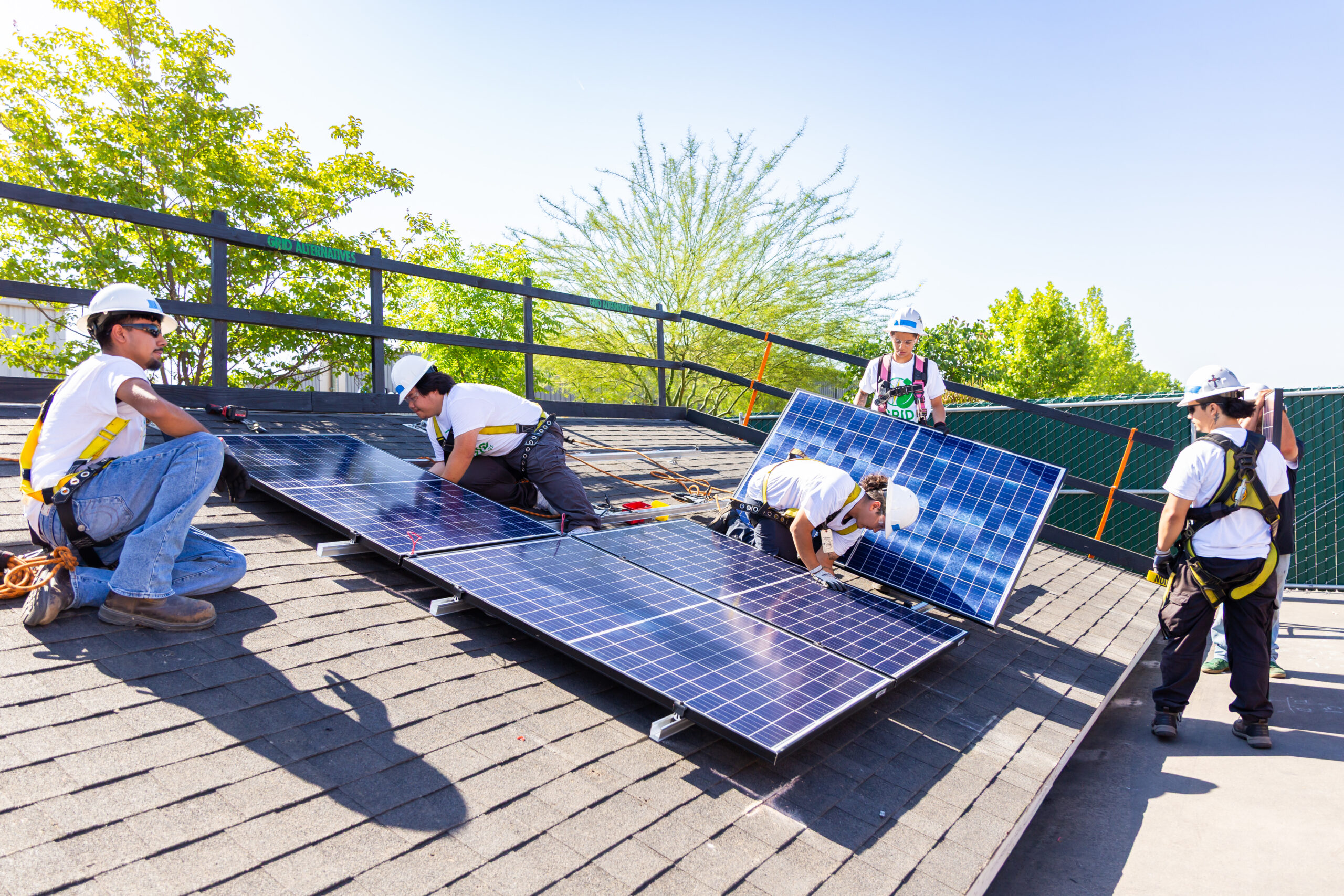 Participants in Central Valley IBT building solar on mock roof