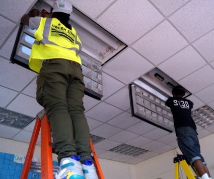 GZEP participants installing lights with AccessGreen at a local elementary school