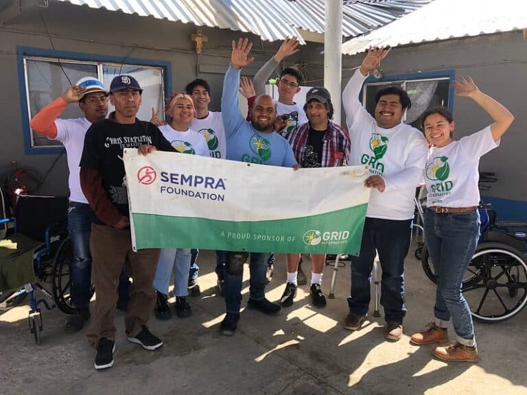 Hermano Pablo group with GRID banner