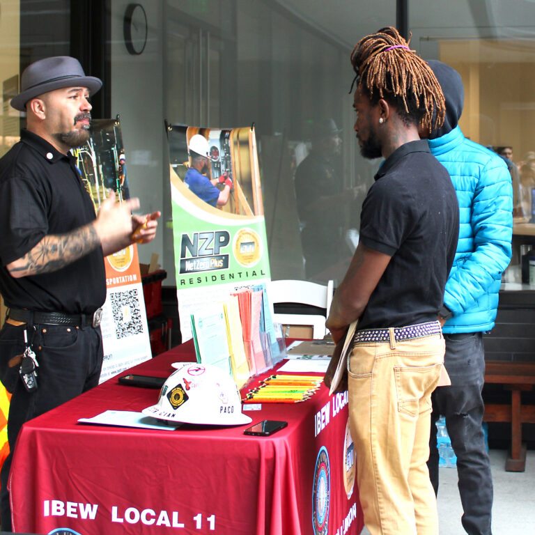 IBEW Local 11 talking to job seekers at the Solar Career Fair