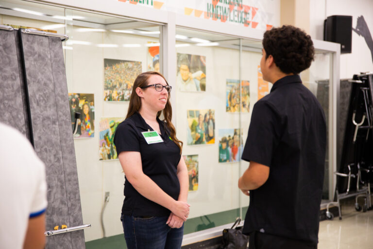 Jackie Brown speaking to a high school student
