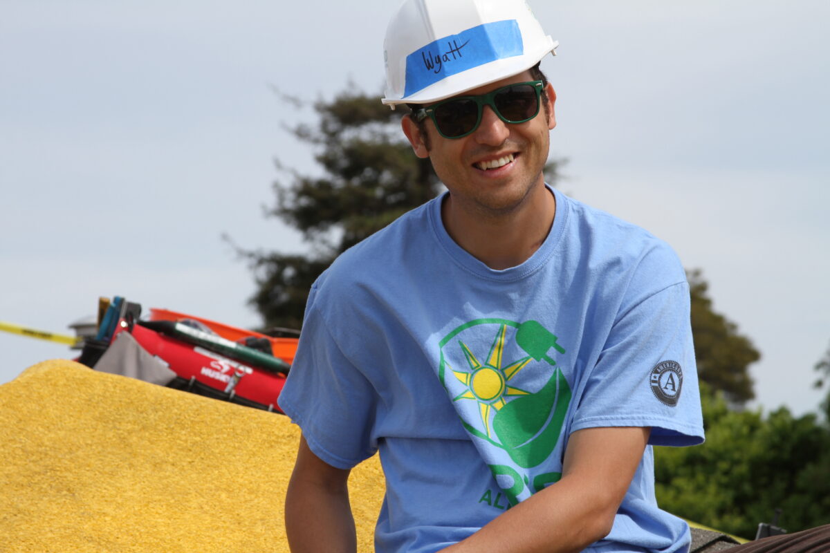 Wyatt Atkinson smiles while at an GRID install