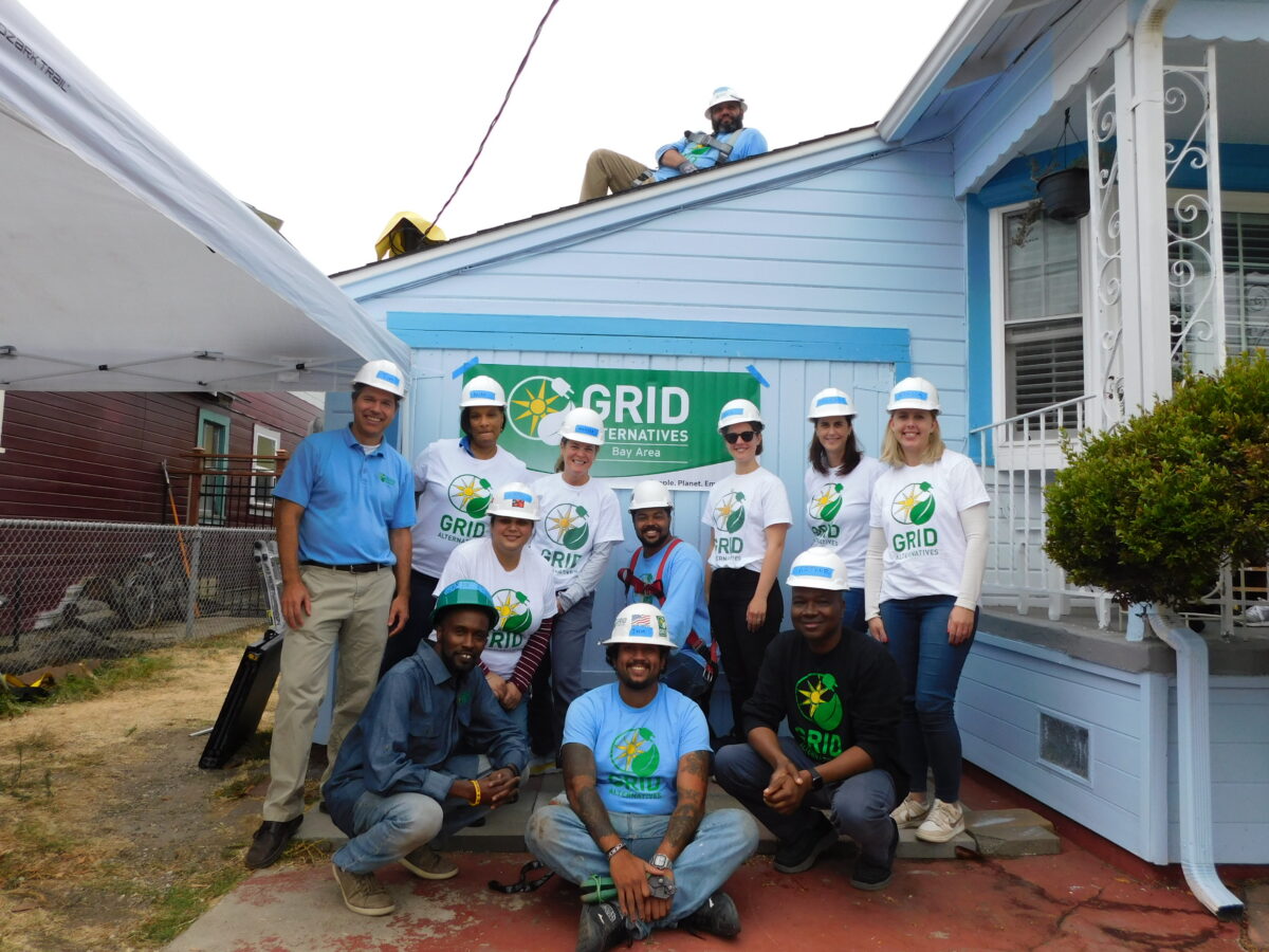 GRID Alternatives Bay Area construction team posing next to BMO[Bank of Montreal] volunteers
