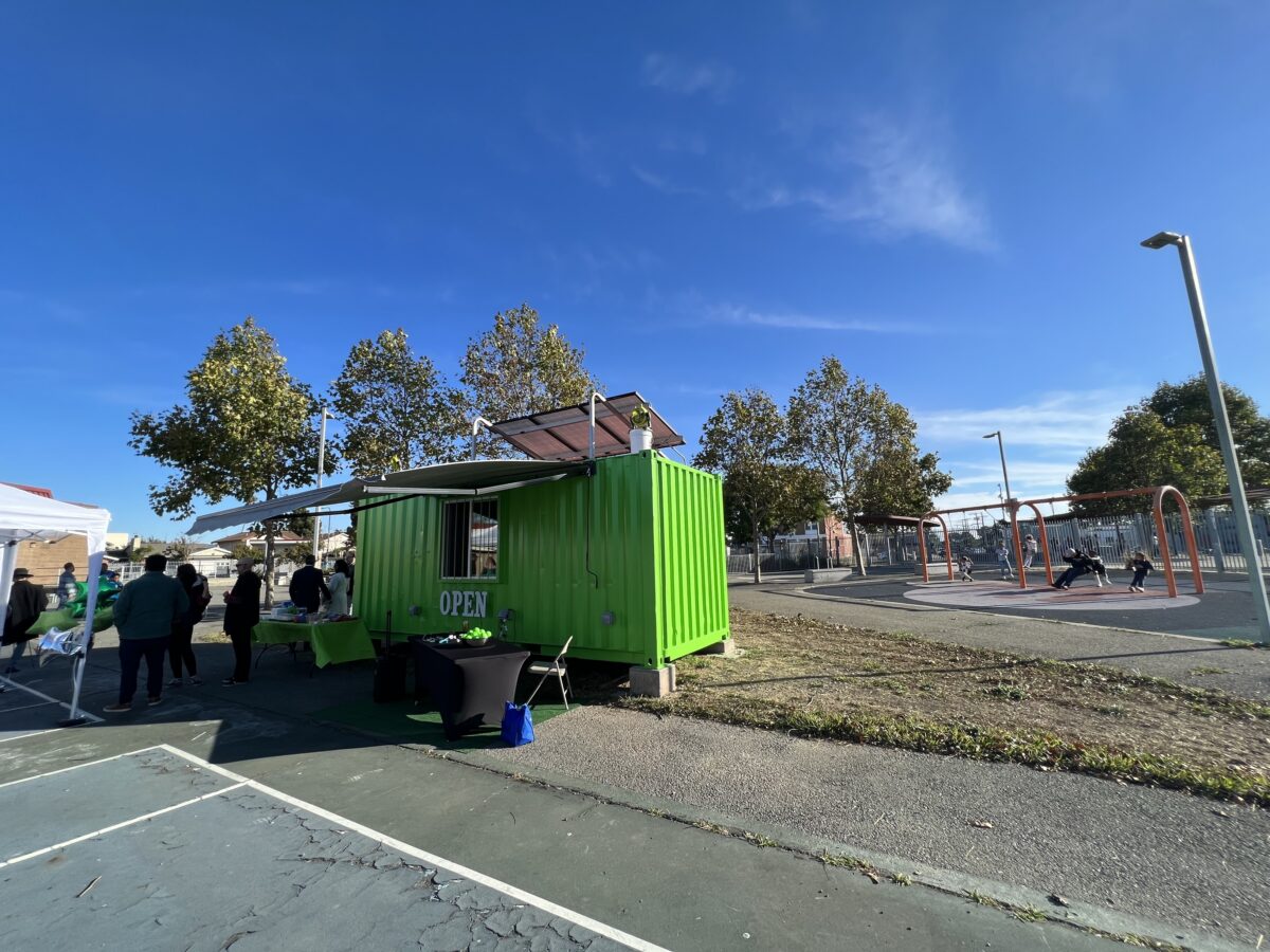 A refurbished container with a brand solar photovoltaic system sits in its new location at Nevin Park, Richmond, CA