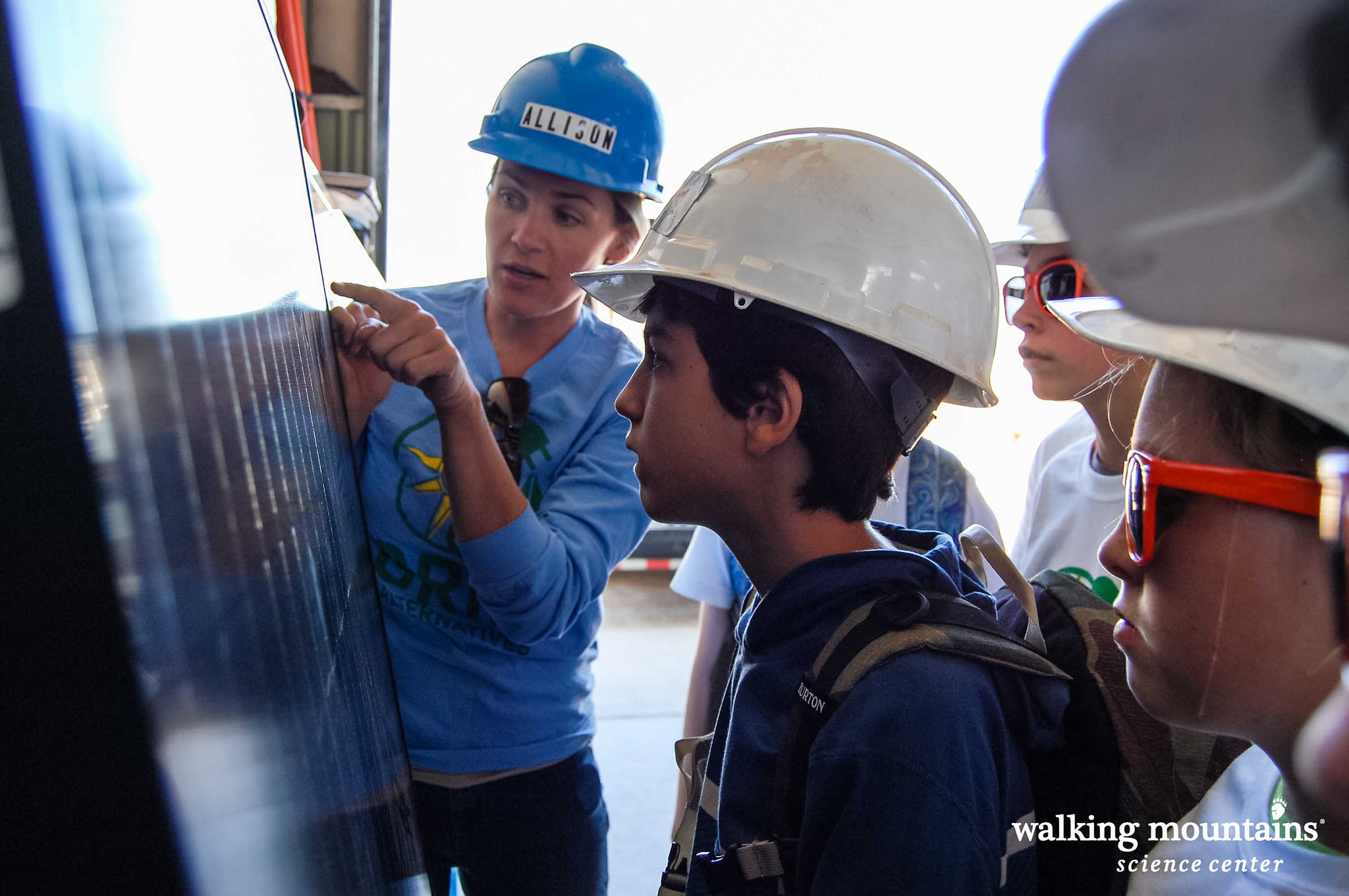 Walking Mountain students with solar panels