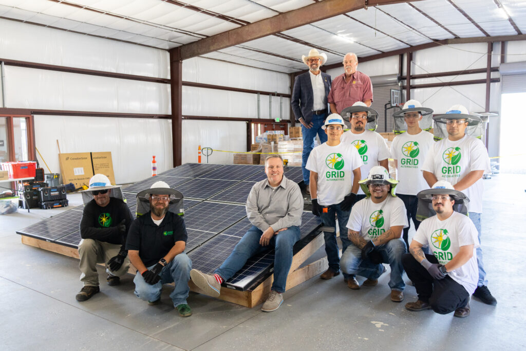 6 trainees from CVOC posing for photos with GRID Staff and partners