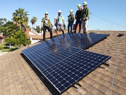 Pre-pandemic photo: Troops to Solar trainees gain hands-on experience installing solar
